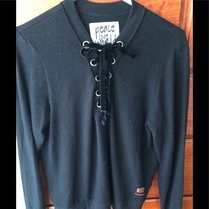 Medium weight black sweater.